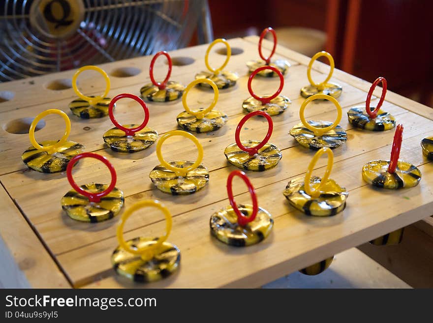 Manufacturing sweet lollypops in a small handmade factory workshop