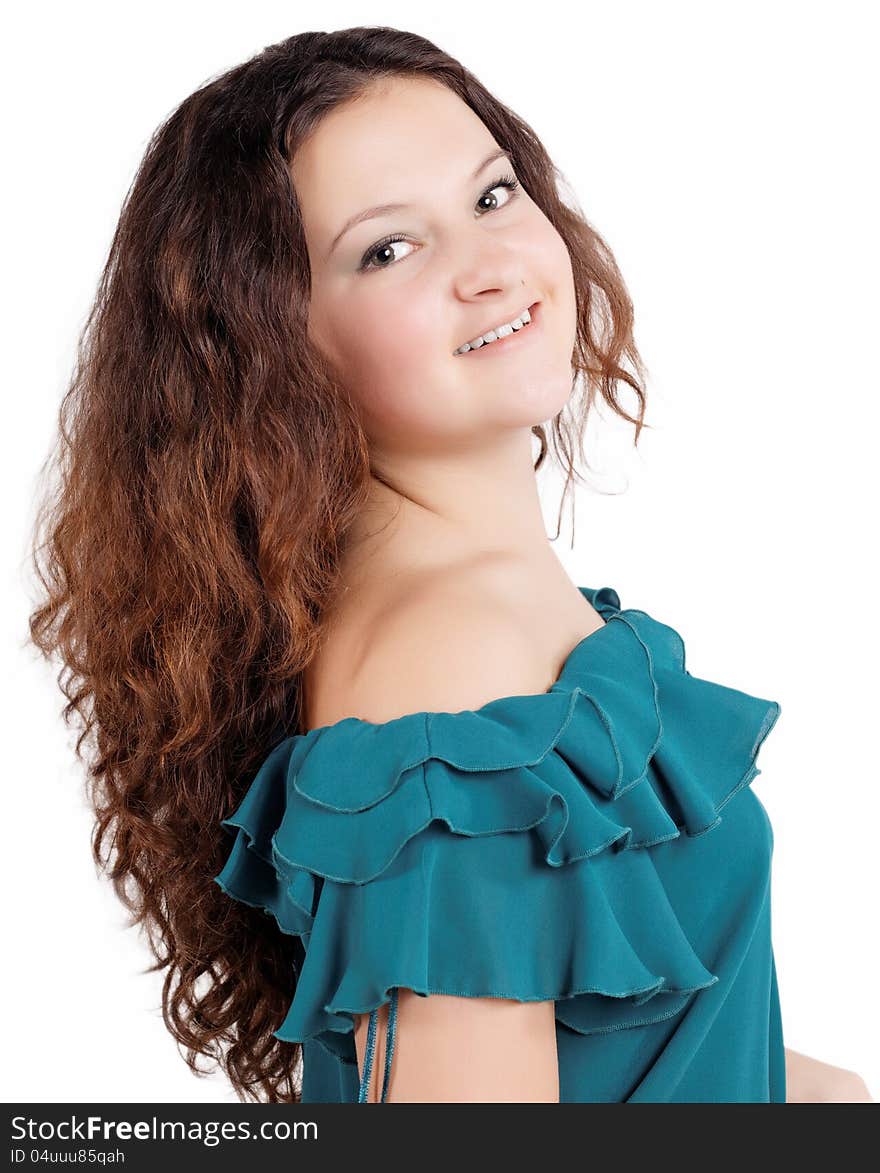 Portrait of a smiling brunette girl on an isolated white background