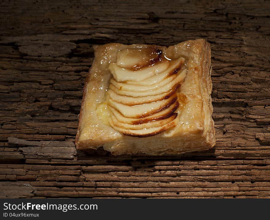 Sliced apples on pastry