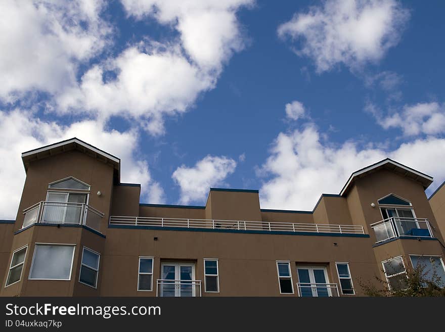 Apartment under cloudy sky