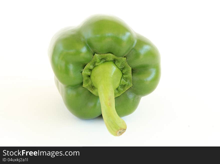 A green bell pepper isolated on white with clipping path