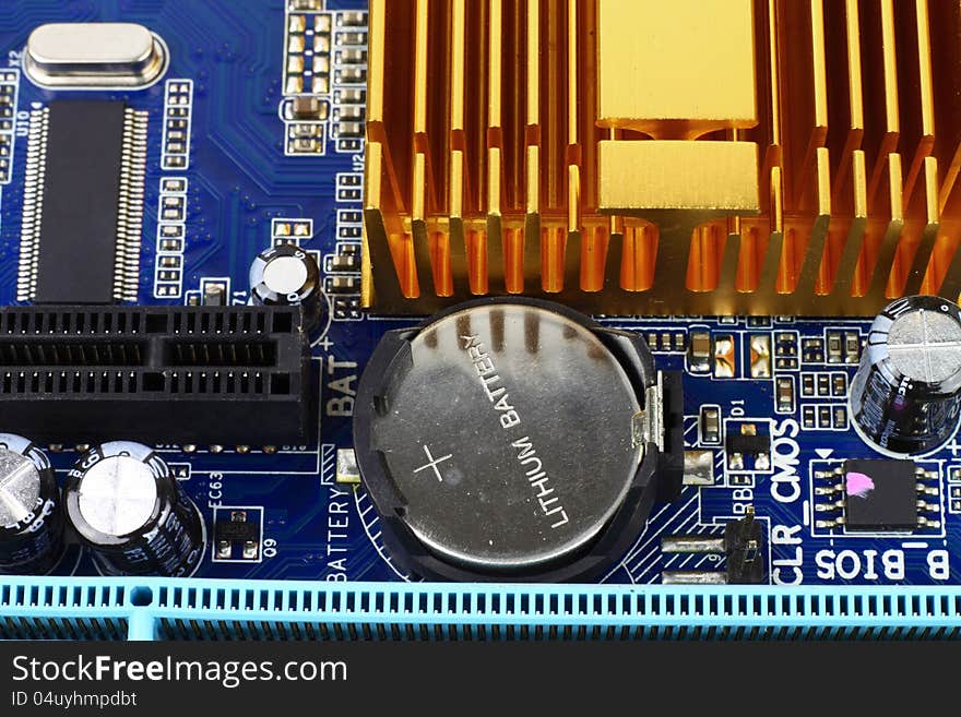 Digital hardware closeup. Microchips and condensers assembly on the circuit board macro. Digital hardware closeup. Microchips and condensers assembly on the circuit board macro