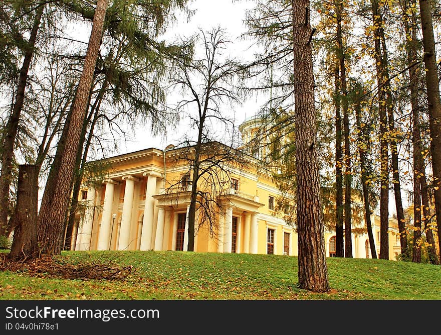 Old-time estate among the autumn trees