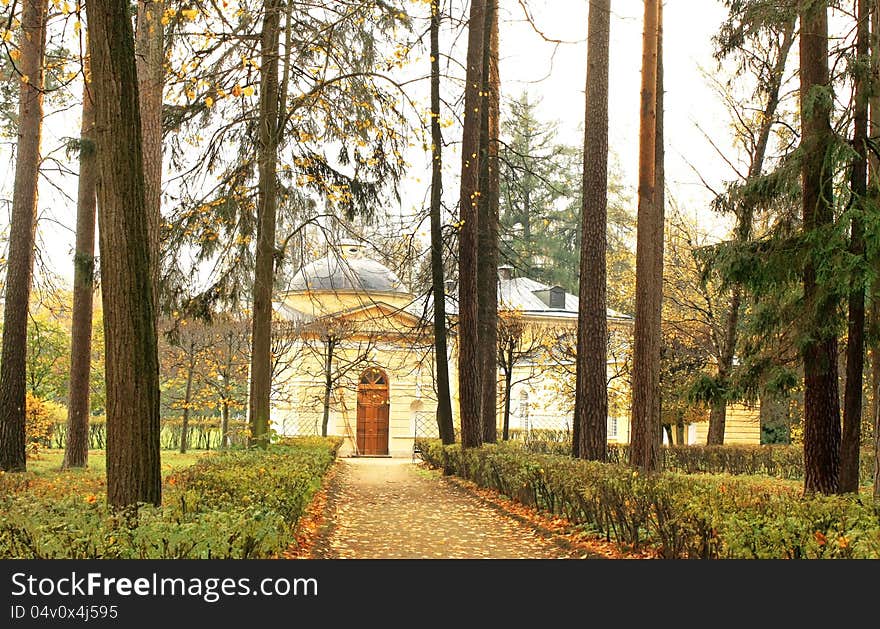 Old-time estate among the autumn trees