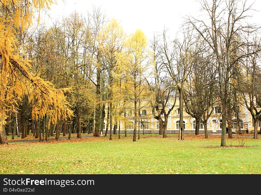 Old-time estate among the autumn trees