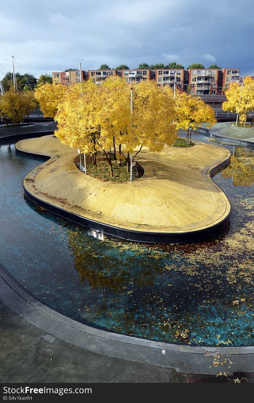 This image presents a beautiful public garden in the center of Almere, Holland. This image presents a beautiful public garden in the center of Almere, Holland