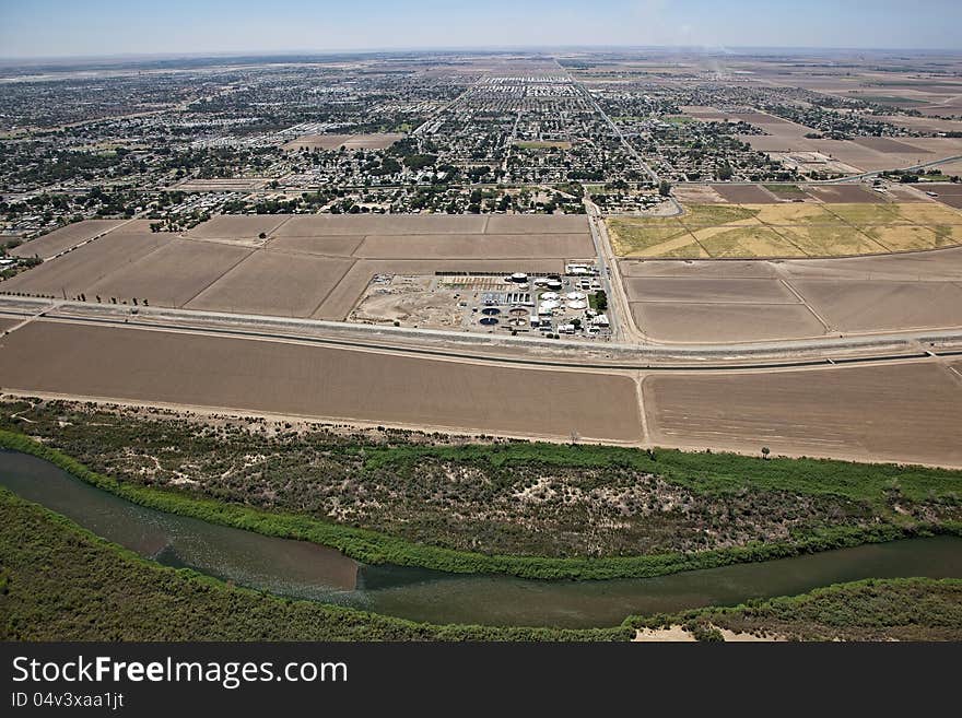 Colorado River at Yuma, Arizona with treatment facility and skyline