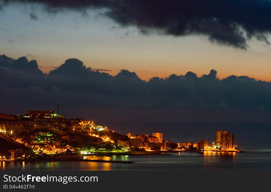 Small spanish city Cullera (Valencia region, Spain) at sunset. Small spanish city Cullera (Valencia region, Spain) at sunset