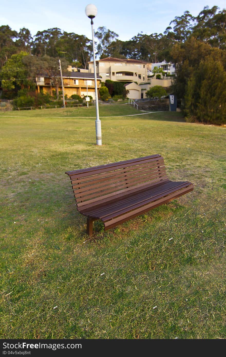 Park chair and lamb closer to residential properties.