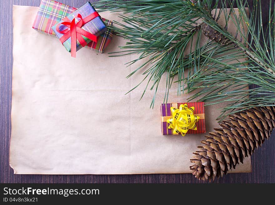 Christmas card with gifts and tree on old paper