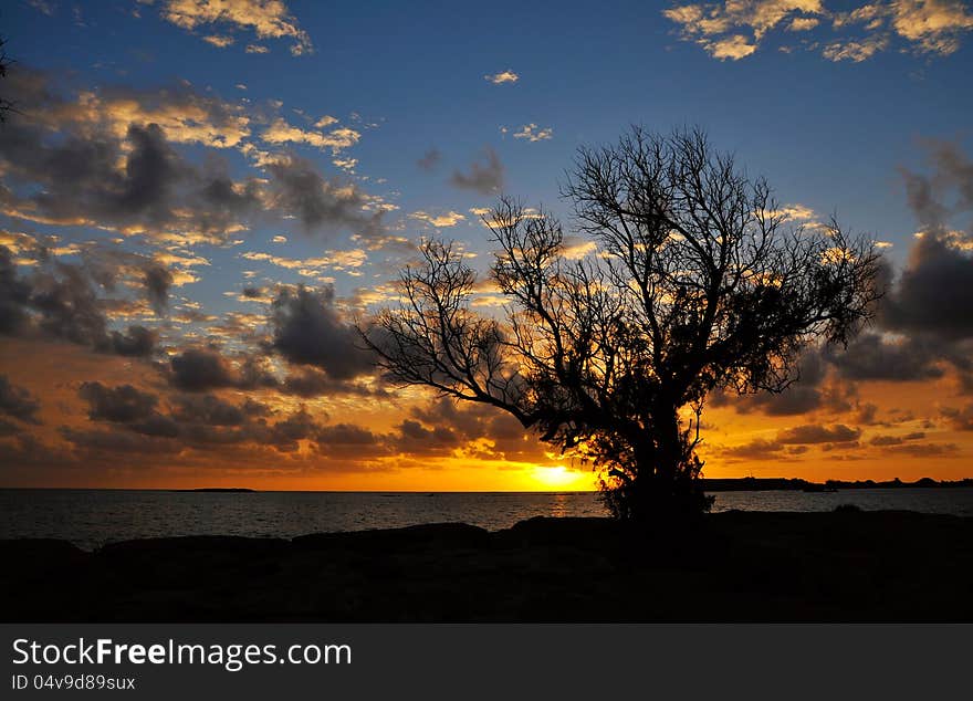 Beautiful sunset on the coast of Libian sea. Greece. Crete. Elafonisi