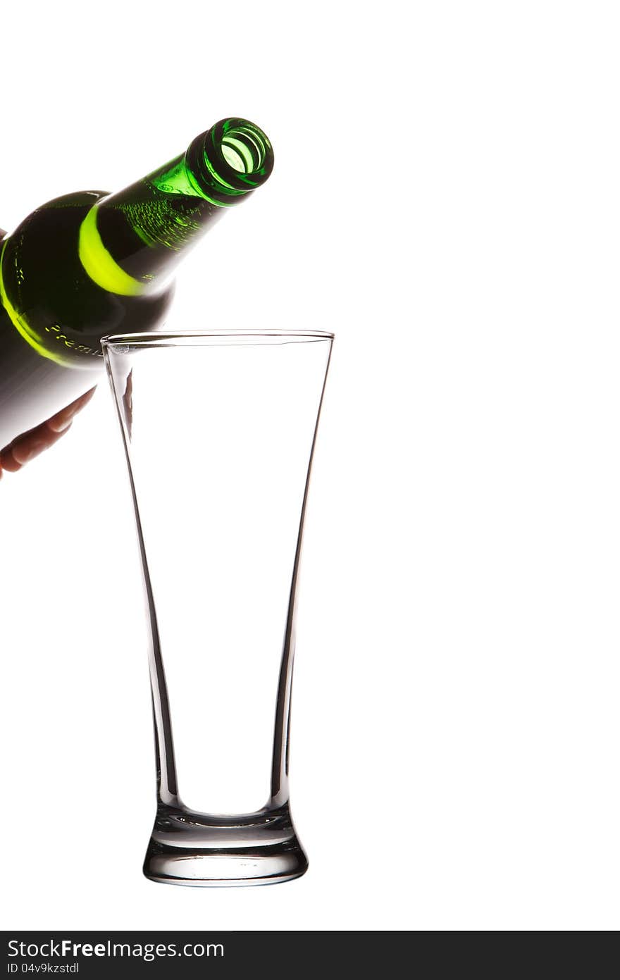 Beer in bottle and glass  on white