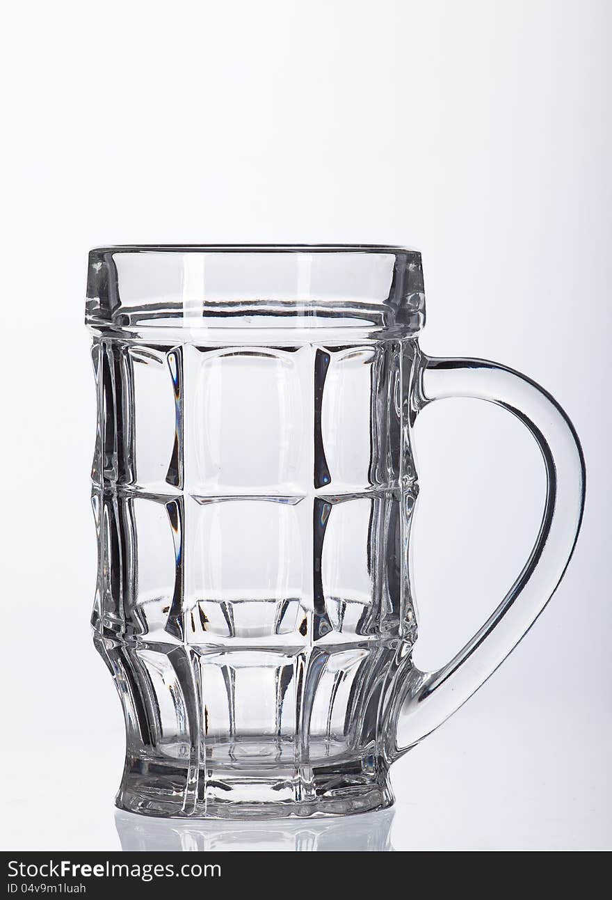 Empty beer glass  on white background