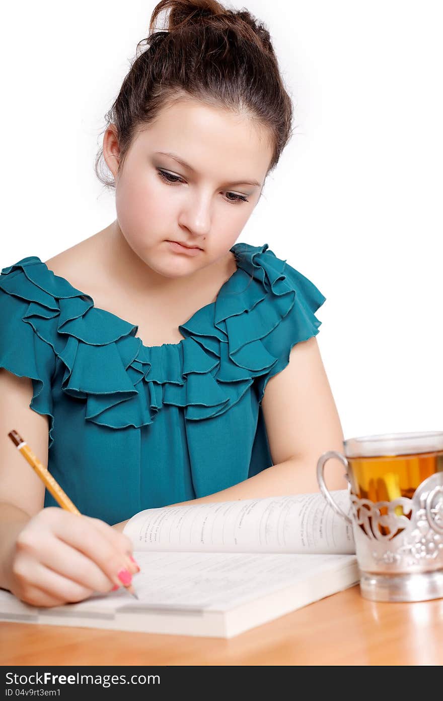 Portrait of a cute student studying isolated