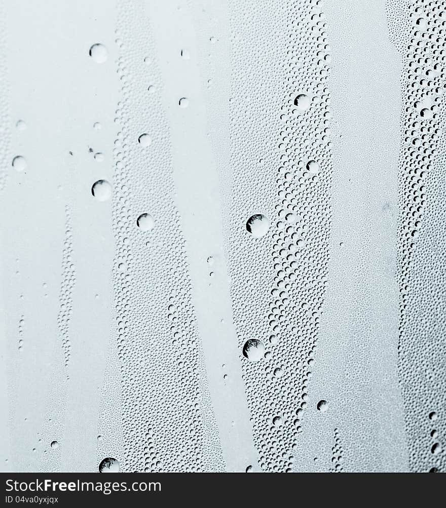 Moist on the roof window after rain in grayscale