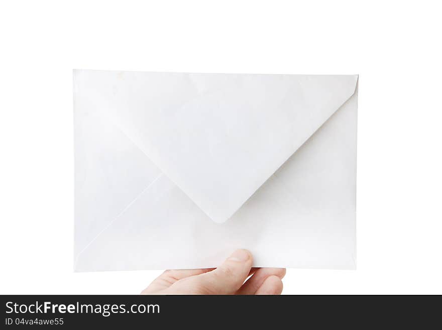 Envelope in the hand isolated on white background