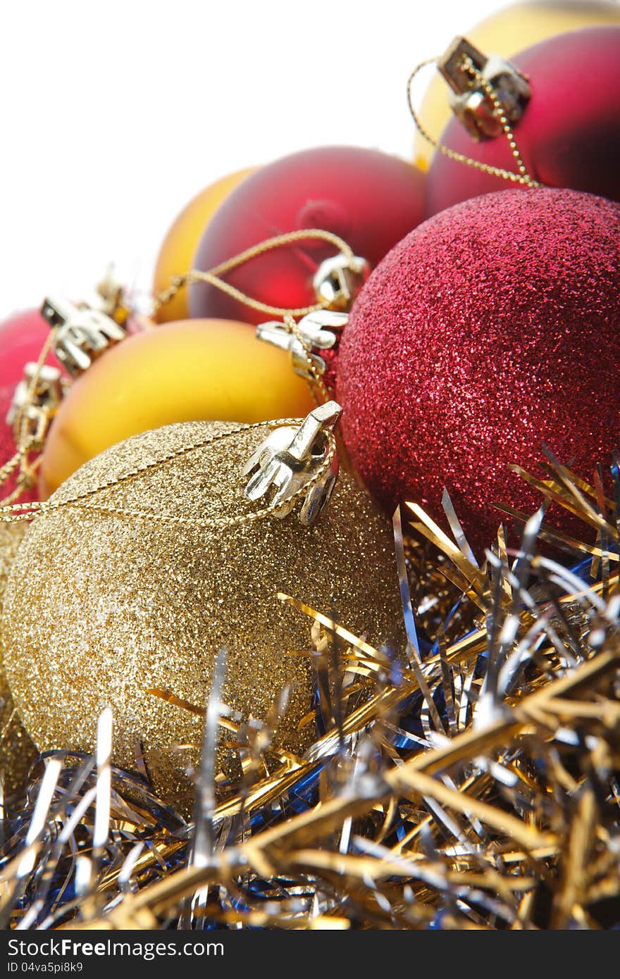 Christmas toys on the white background and garlands