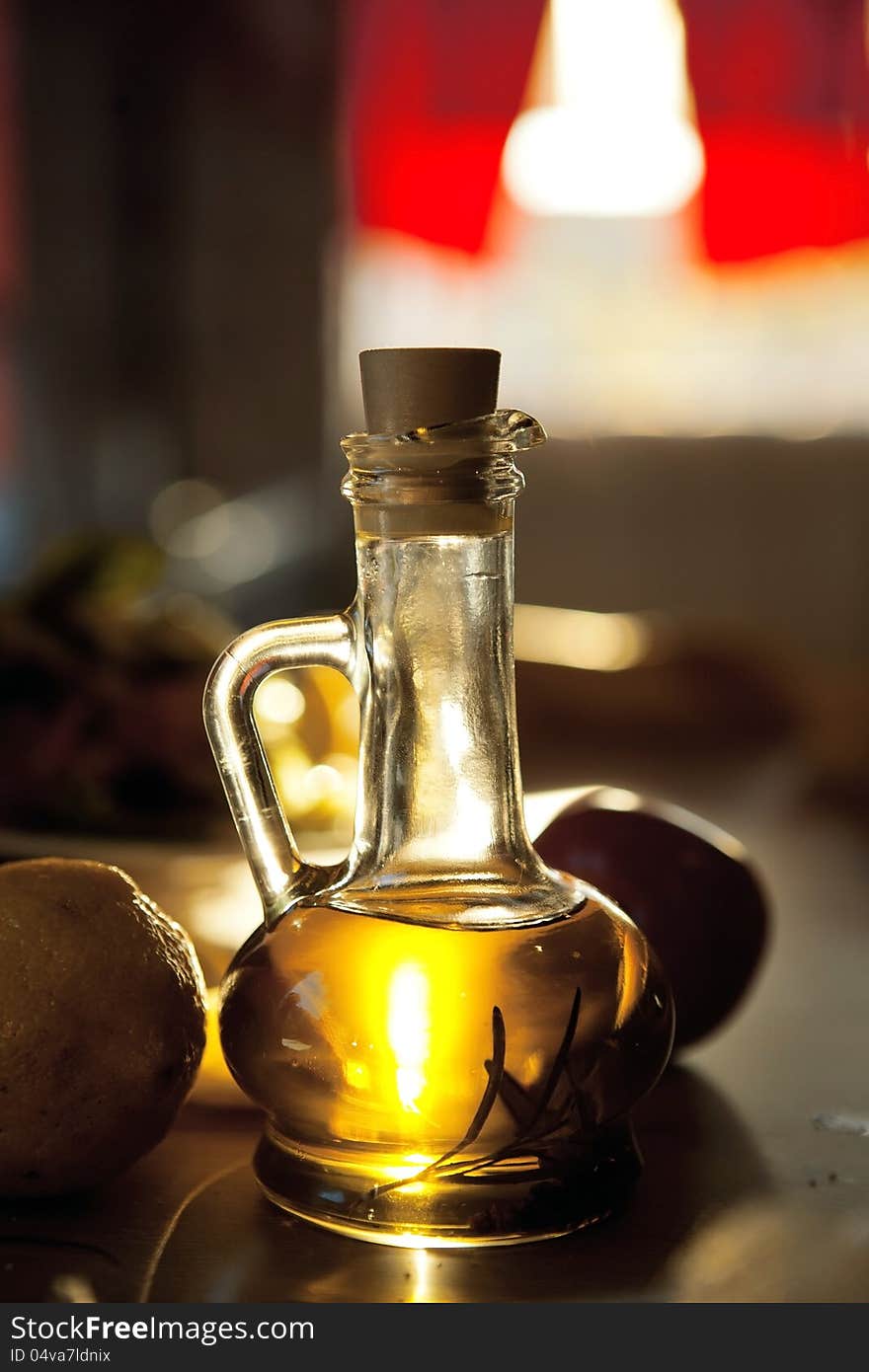 Bottle of a golden olive oil in restaurant