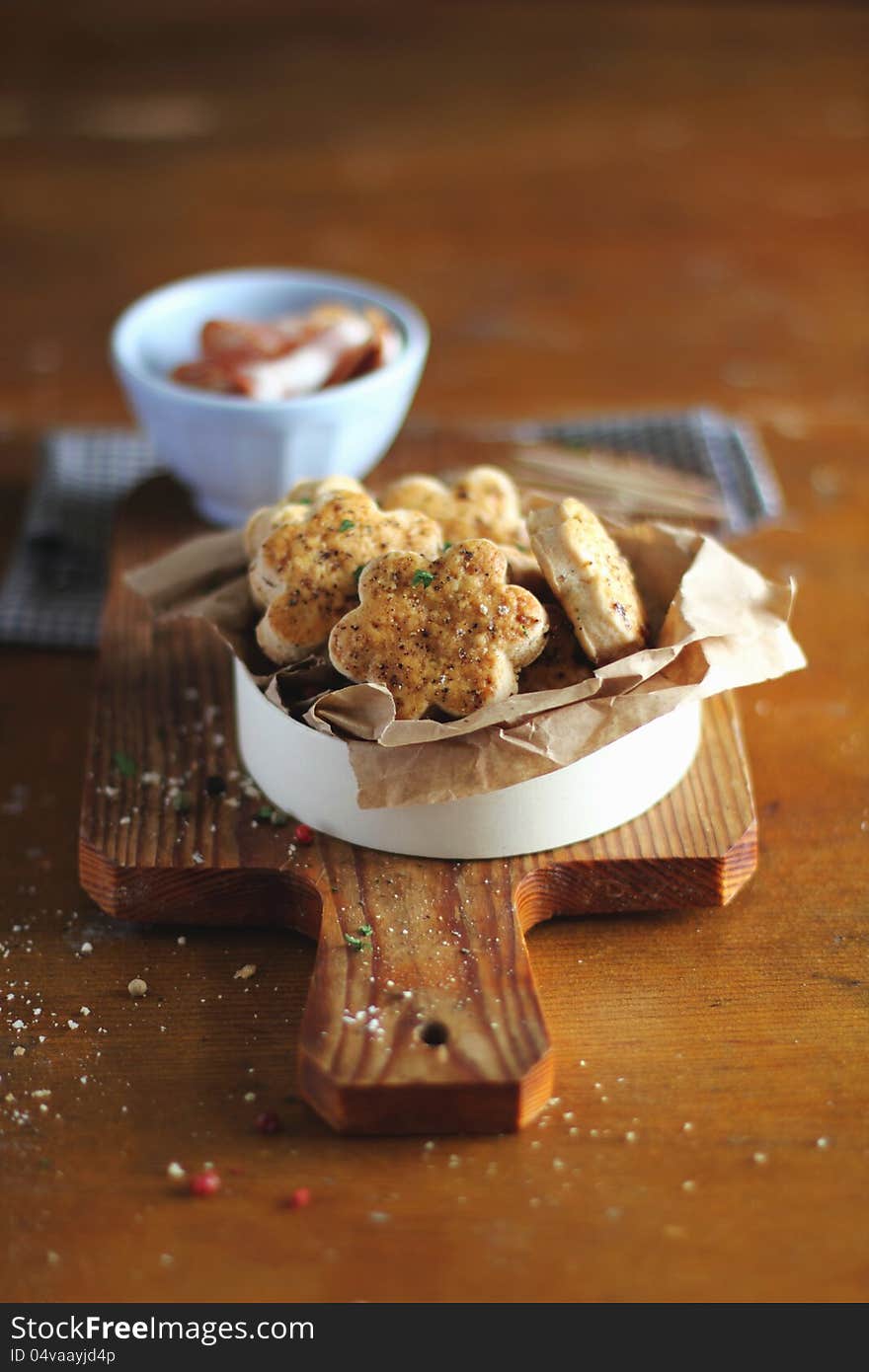 Cookies with bacon, basil and maple syrup in a box for breakfast or snack