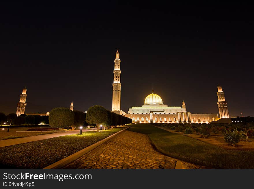 Night shot of the Sultan Qaboos Grand Mosque in Muscat, Oman. Wide angle showing all five minarets. Night shot of the Sultan Qaboos Grand Mosque in Muscat, Oman. Wide angle showing all five minarets.