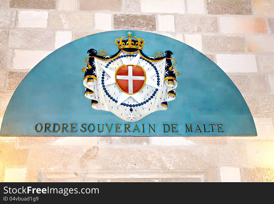 Coat of Arms of the Sovereign Military Order of Malta in the Grand Master Palace at Rhodes island, Greece. Coat of Arms of the Sovereign Military Order of Malta in the Grand Master Palace at Rhodes island, Greece