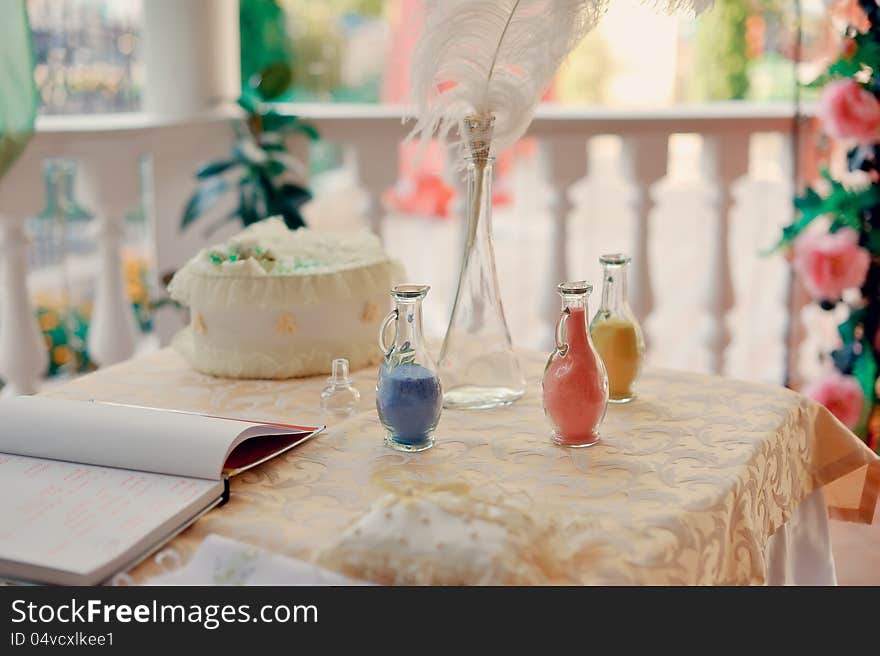 Beautiful bottles with a picture and colored sand inside. Beautiful bottles with a picture and colored sand inside