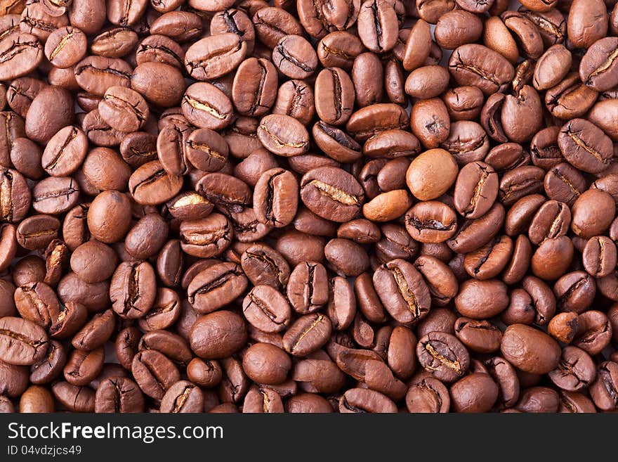 Brown roasted coffee beans close-up