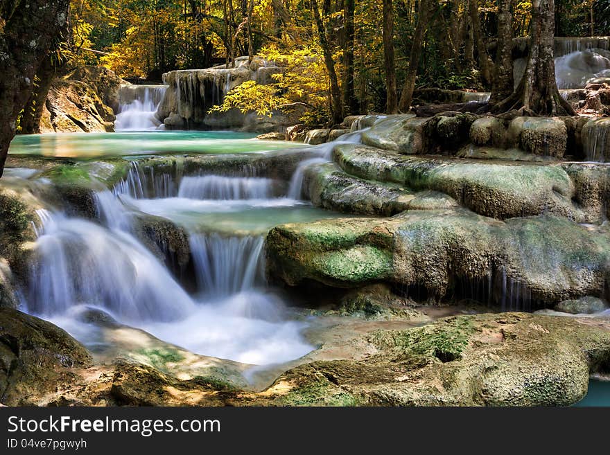 Mountain stream among the mossy stones, Erawan waterfall, Thailand