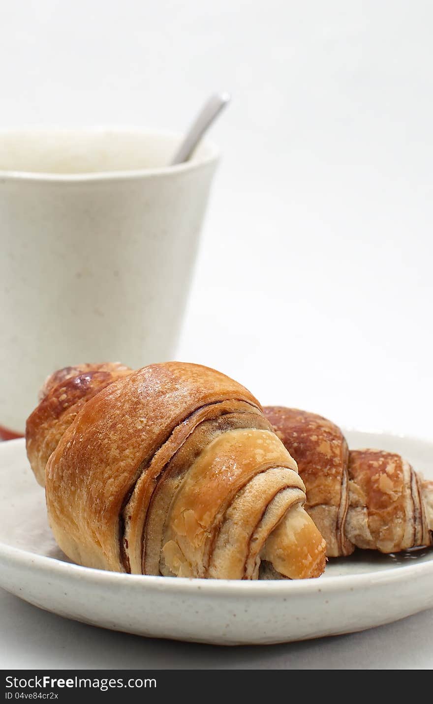 Mini croissants on white background