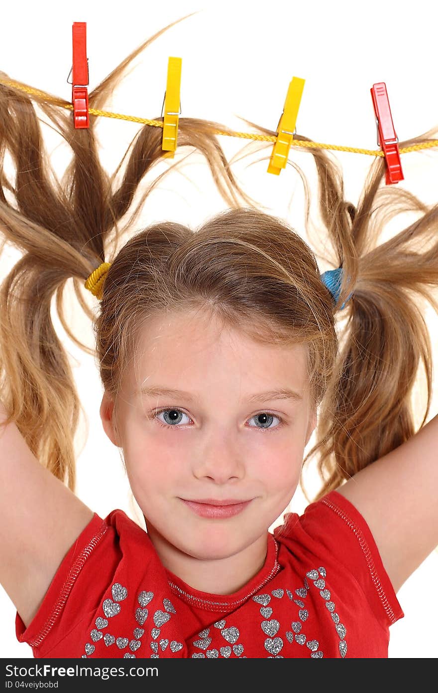 Girl with paperclips in hair on the white background