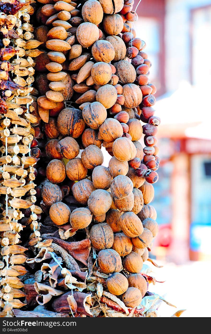 A bunch of nuts on the market. In conjunction walnuts, almonds, and still unknown to me.