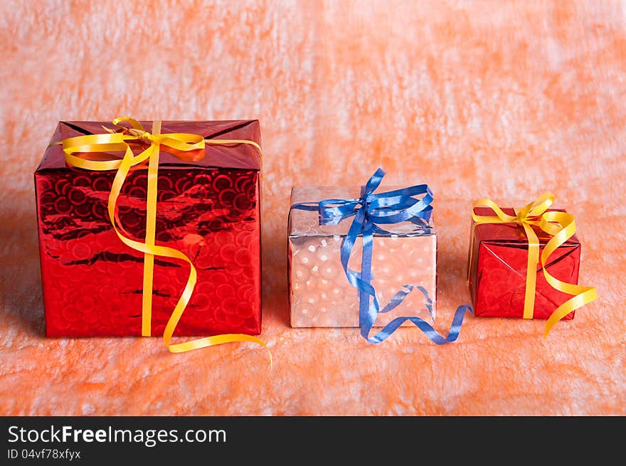 Gift Boxes On An Orange Background