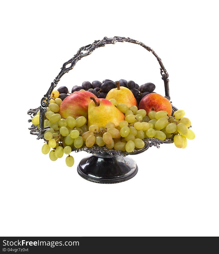 Antique vase with fruits. Isolated.