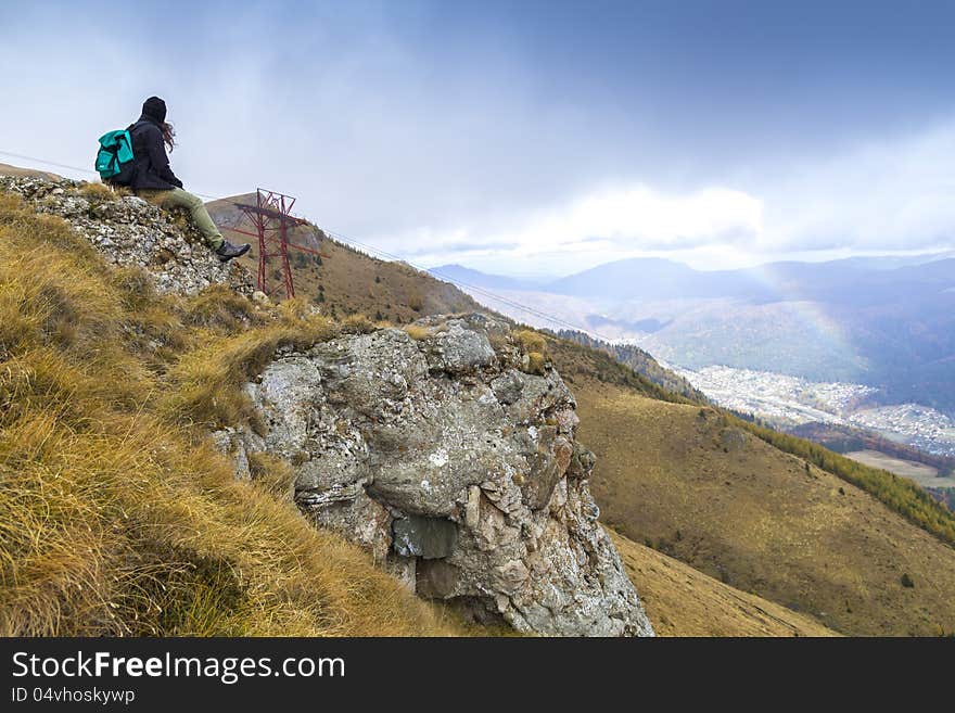 Mountain climber taking a rest. Mountain climber taking a rest