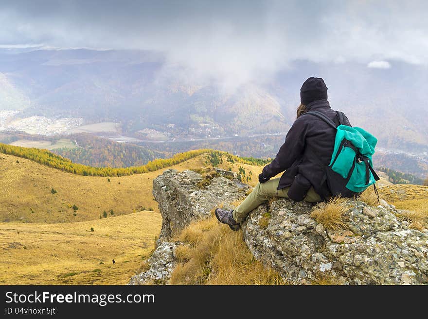 Mountain climber taking a rest. Mountain climber taking a rest