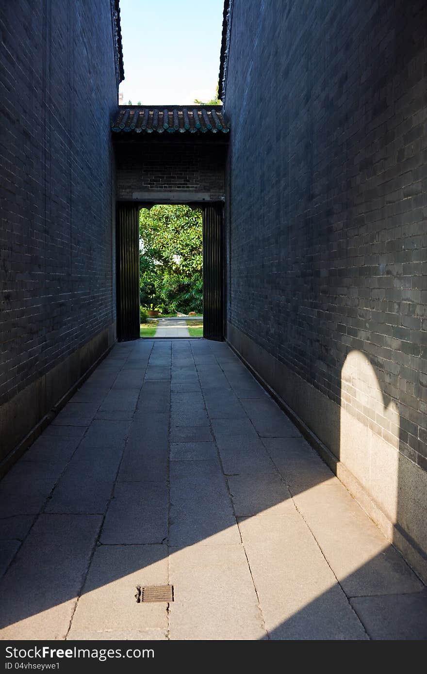 An alley between two ancient Chinese building in Chen's Lineage Hall in Guangzhou City,China. An alley between two ancient Chinese building in Chen's Lineage Hall in Guangzhou City,China.