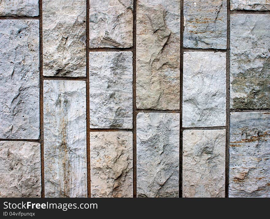 Wall with syone granite bricks as texture and background. Wall with syone granite bricks as texture and background