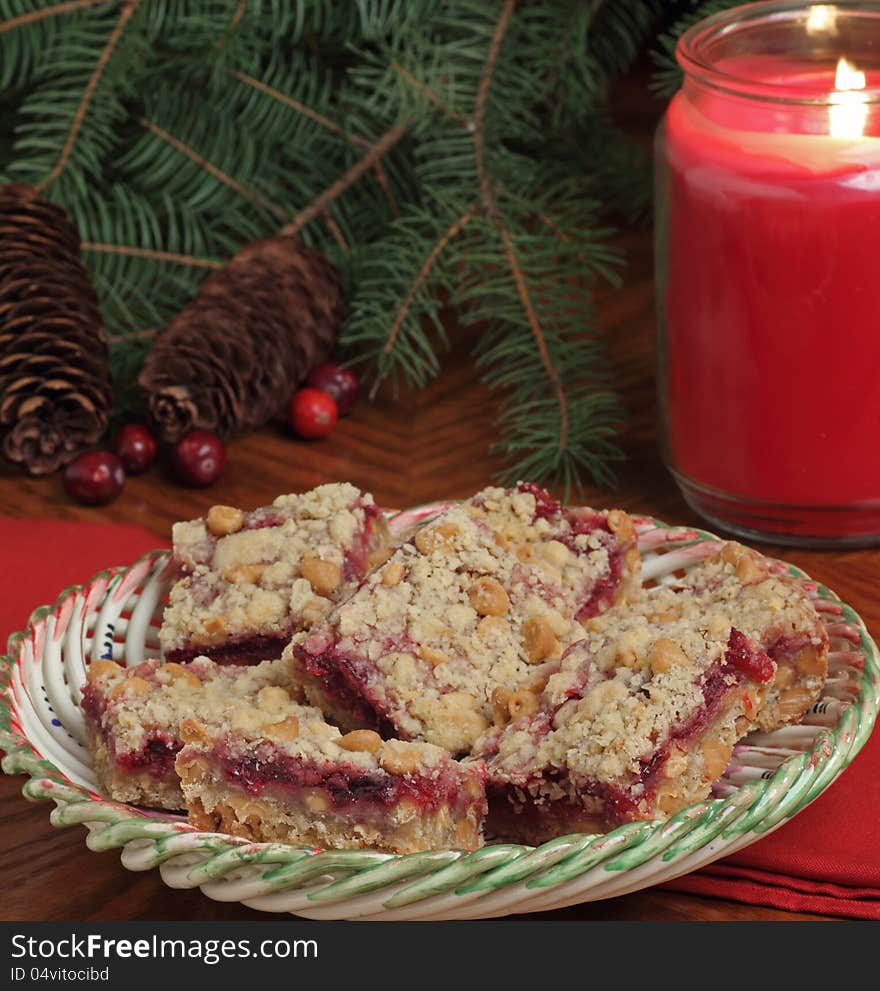 Holiday cranberry and peanut butter bars on a plate. Holiday cranberry and peanut butter bars on a plate