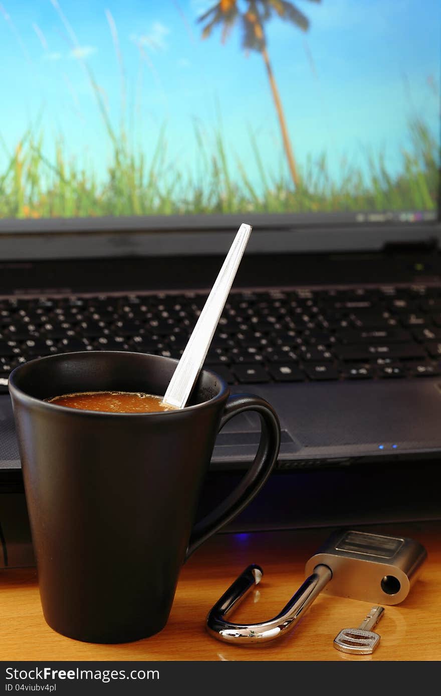 Coffee cup and key your computer. Coffee cup and key your computer