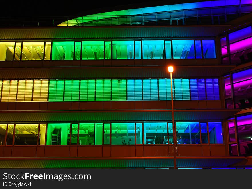 Luminous colored  cladding at night. Luminous colored  cladding at night