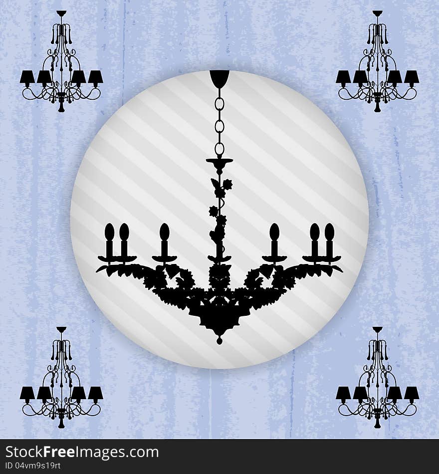 Luxury chandelier on scratched blue wallpaper