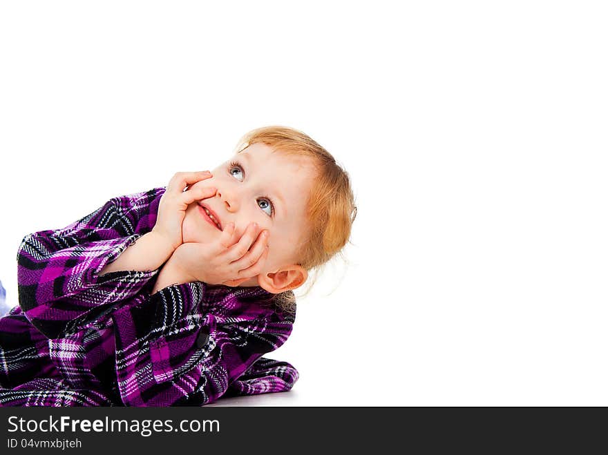 A little girl in a dress, looking from the outside, look at the top of isolated on white background