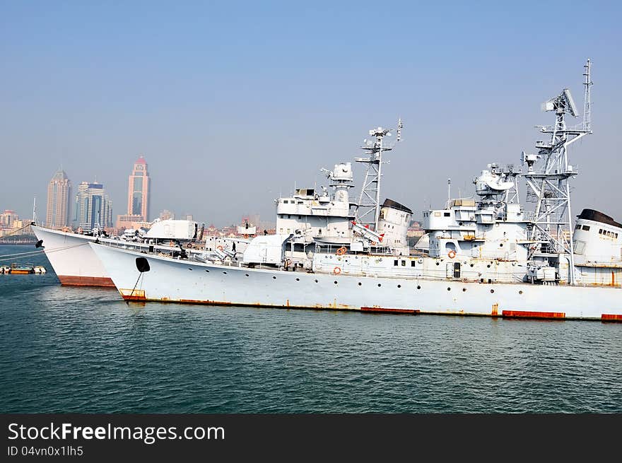 Two warships docked at the pier，which taken in the Chinese Navy Museum. Two warships docked at the pier，which taken in the Chinese Navy Museum