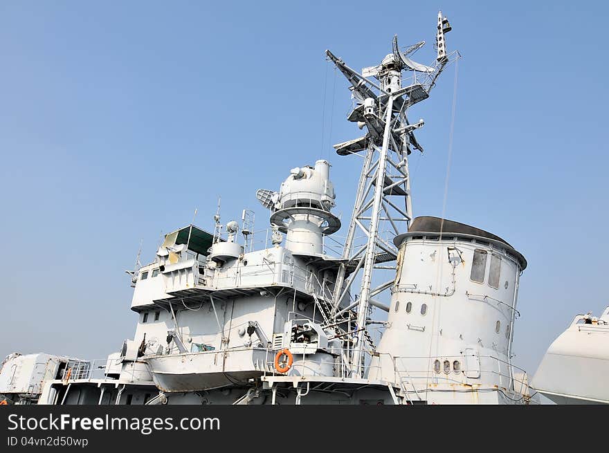 A warship docked at the pier，which taken in the Chinese Navy Museum. A warship docked at the pier，which taken in the Chinese Navy Museum