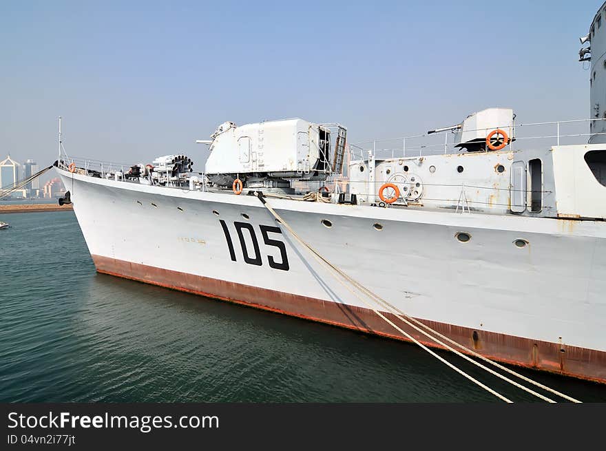 A warship docked at the pier，which taken in the Chinese Navy Museum. A warship docked at the pier，which taken in the Chinese Navy Museum