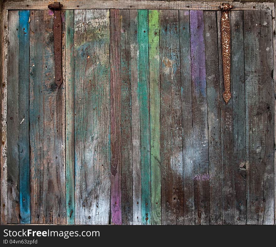 The old wooden vintage colored door