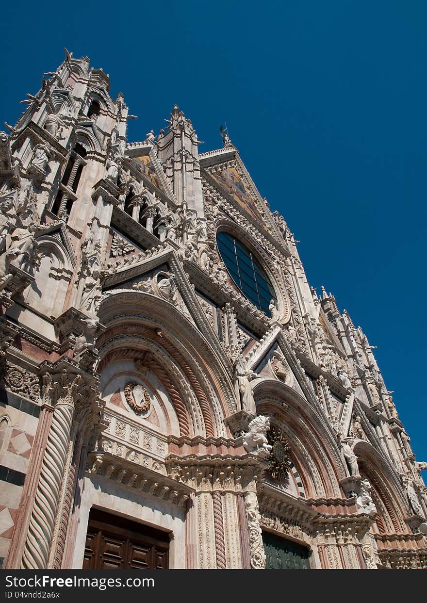 The facade of the Cathedral in Siena. The facade of the Cathedral in Siena