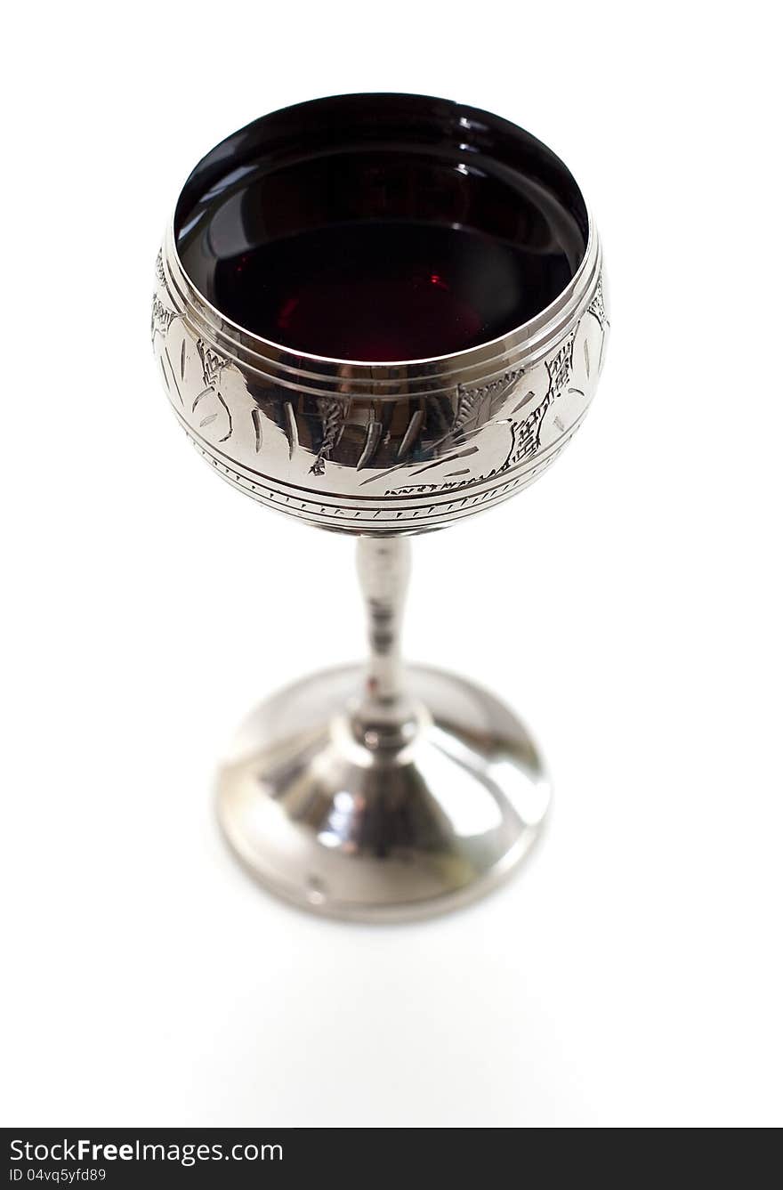 Metal goblet with red wine