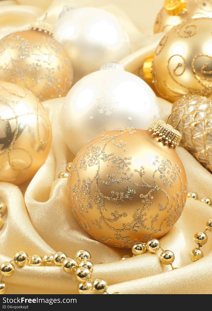 Christmas Ornaments On Golden Satin.