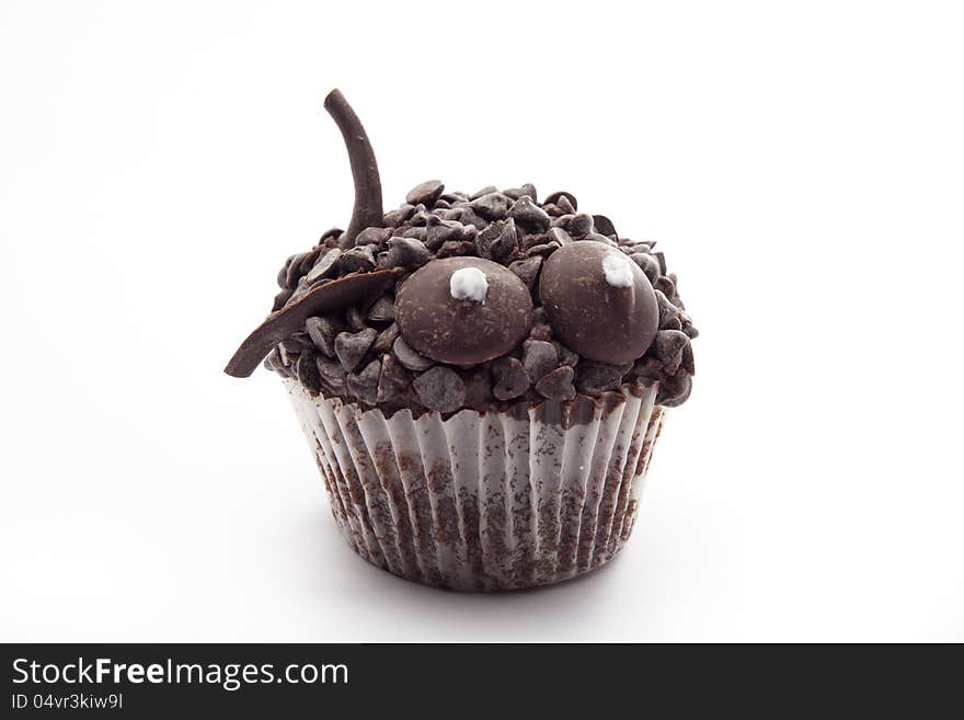 Chocolate muffin isolated on white